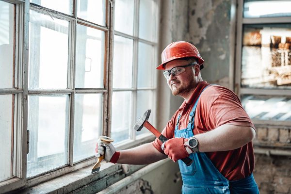 side-view-of-handsome-bearded-electrician-repairin-resize.jpg